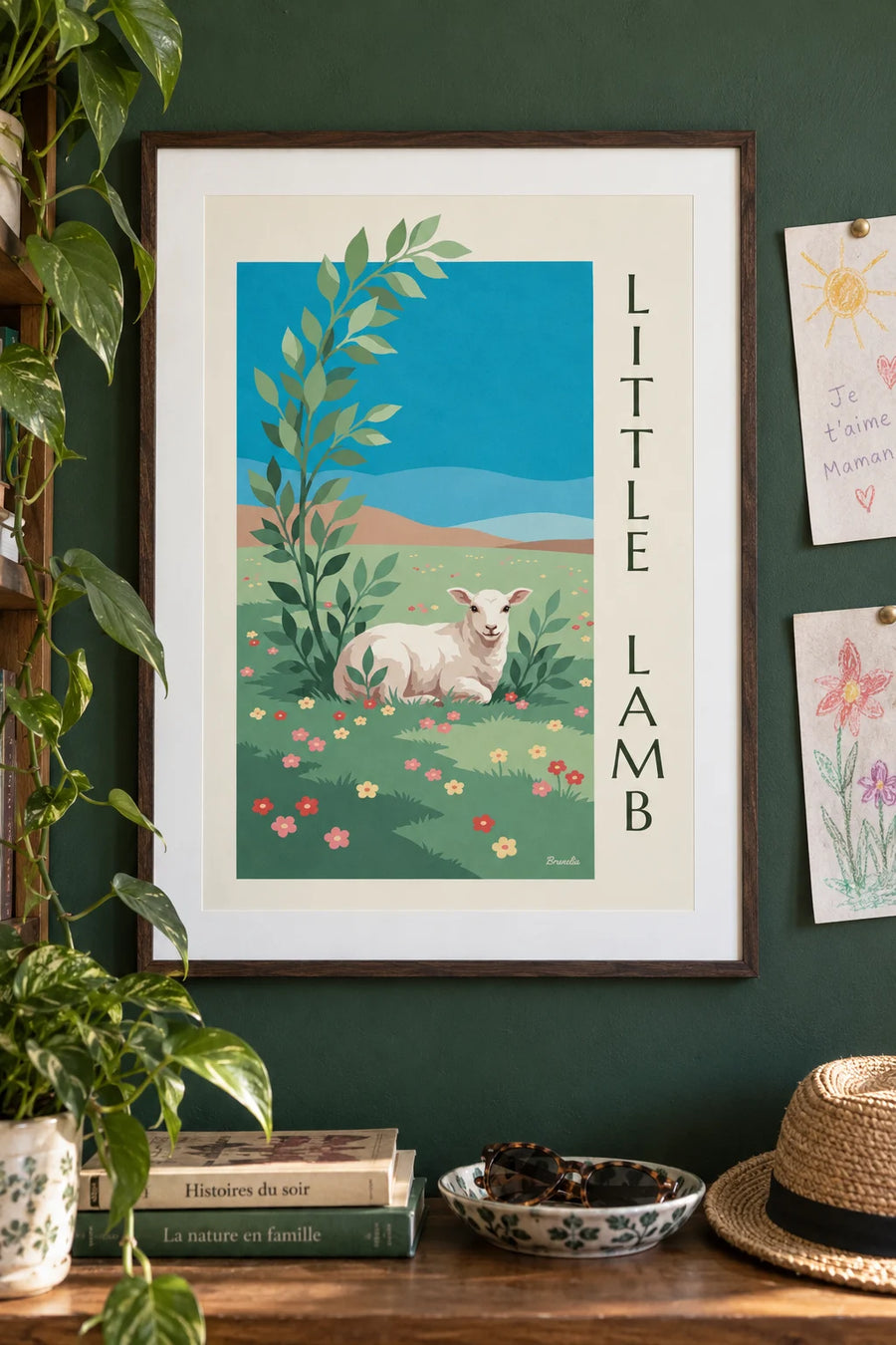 Poster of a little white lamb in a flowering meadow: framed on the wall