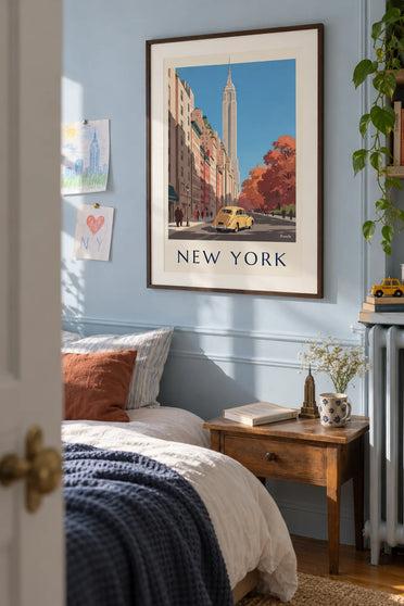 Poster of a yellow car and the Empire State Building in autumn: framed on the wall