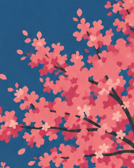 Un ramo di ciliegio carico di fiori rosa contro il cielo blu notte