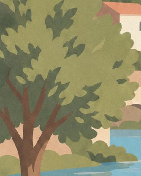 A tree with green leaves and a brown trunk in front of the houses and blue water