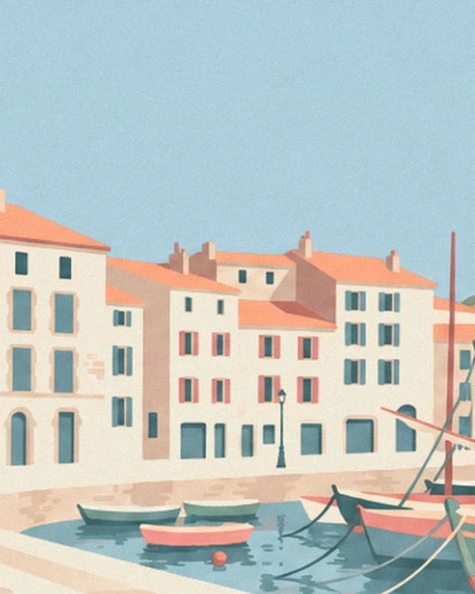 Pale façades with orange roofs and colourful boats in the port des Pêcheurs