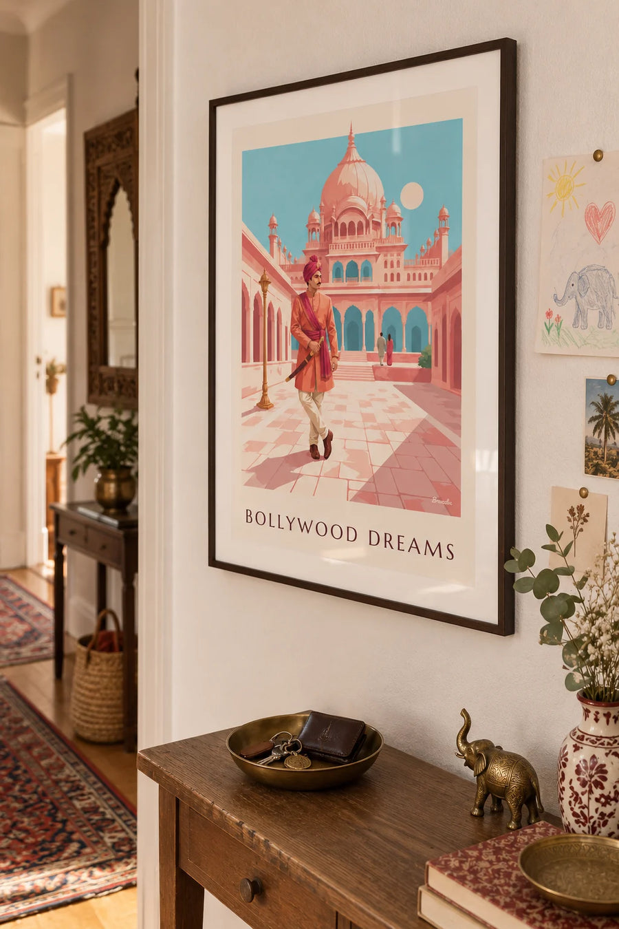 Bollywood poster of an Indian hero in front of a domed palace: framed on the wall