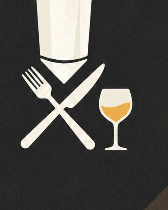A crossed fork and knife and a glass of golden white wine beneath the chef's hat, against a slate background