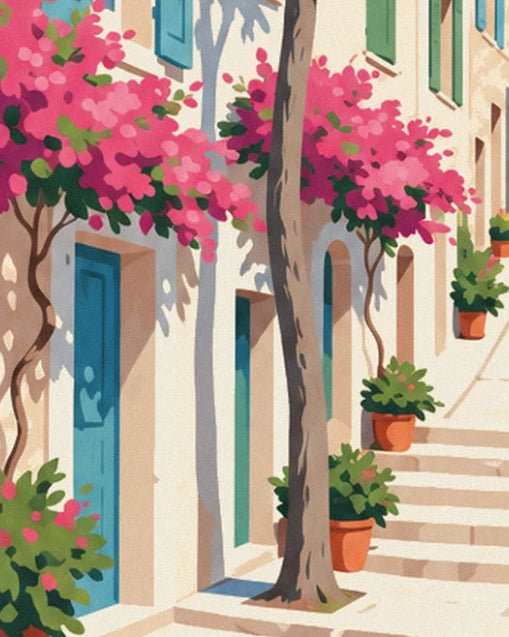 La scalinata nel vicolo stretto, tra una porta blu, alberi in fiore rosa e vasi di terracotta
