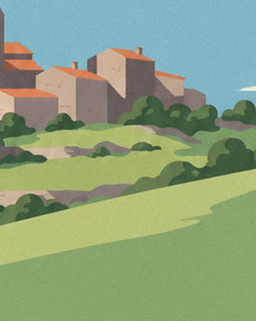 Les maisons aux toits orangés au-dessus des collines vertes bordées de buissons