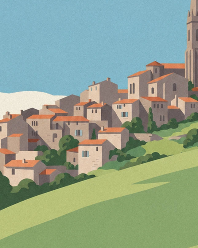 Les maisons aux toits orangés et le clocher du village sur la colline verte