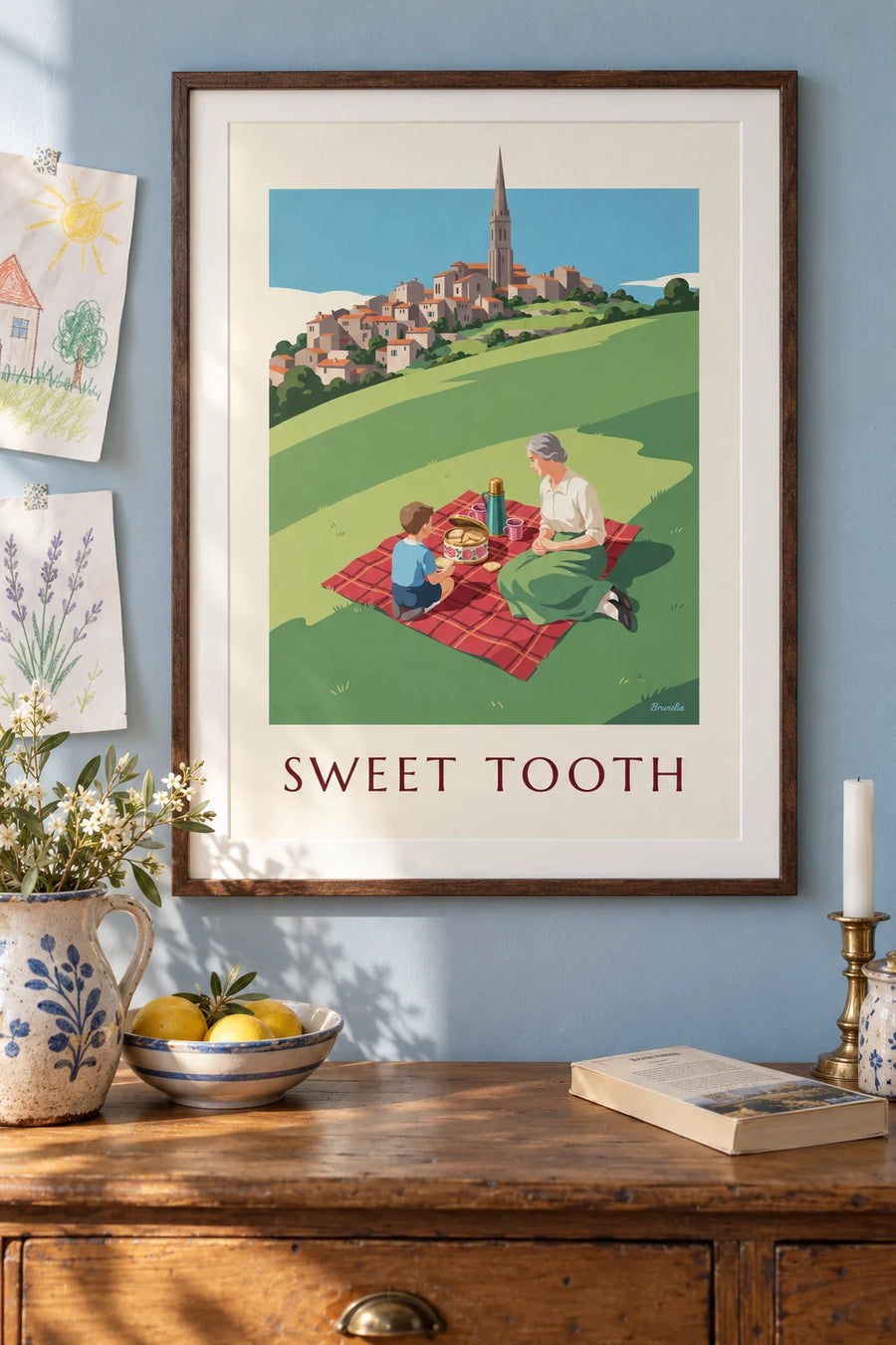 Affiche pique-nique et boîte à biscuits fleurie sur une colline : encadrée au mur