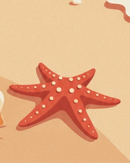 Une étoile de mer rouge orangé aux points crème sur le sable doré