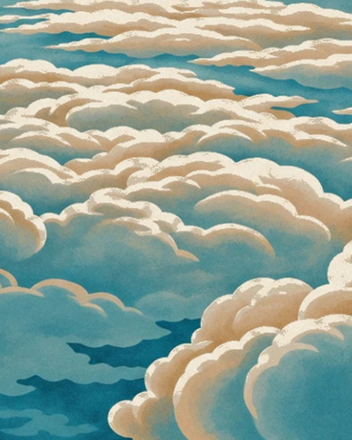 A sea of clouds with cream edges and turquoise blue shadows