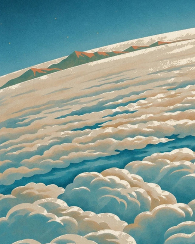 Peaks with orange ridges on the horizon, above a sea of clouds
