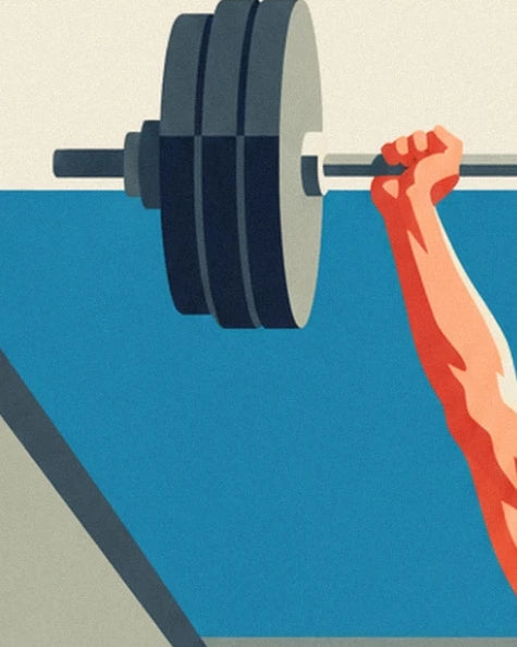The hand gripping the bar loaded with dark weight plates against a blue background