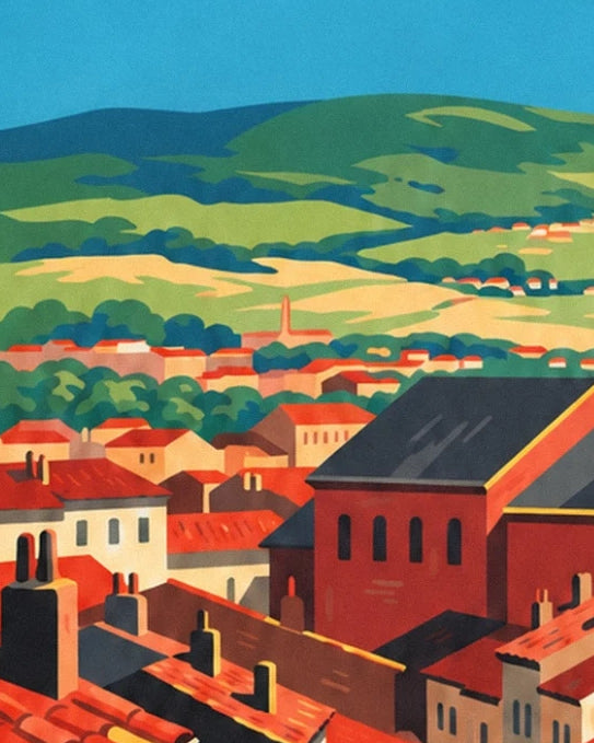 I tetti rossi di Mulhouse e gli edifici industriali davanti alle colline