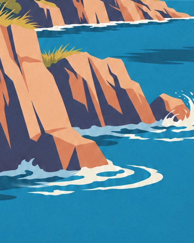 Les falaises orangées aux ombres sombres, bordées d’écume sur la mer turquoise