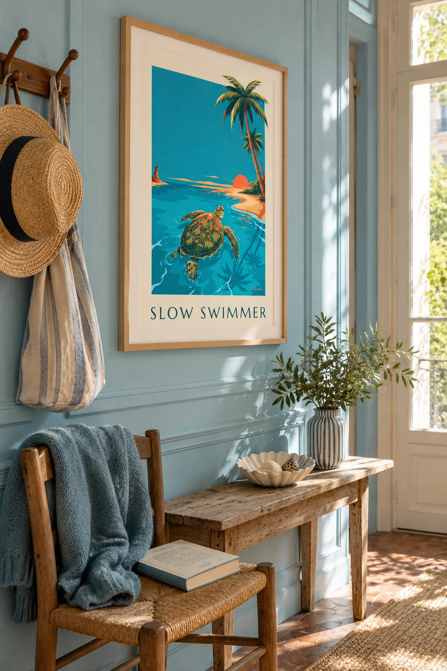 Sea turtle poster, a turtle swimming in turquoise water at sunset: framed on the wall