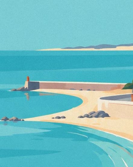 La digue au petit feu rouge, les rochers gris et la plage de sable doré