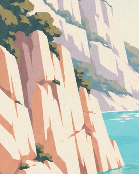 The pale cliffs of En-Vau with touches of greenery above the sea