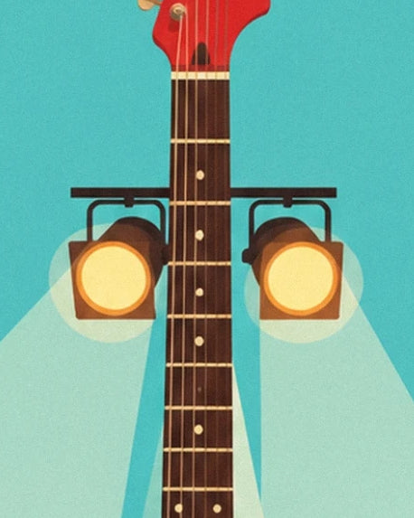 Il manico della chitarra rossa tra 2 faretti gialli dai fasci luminosi