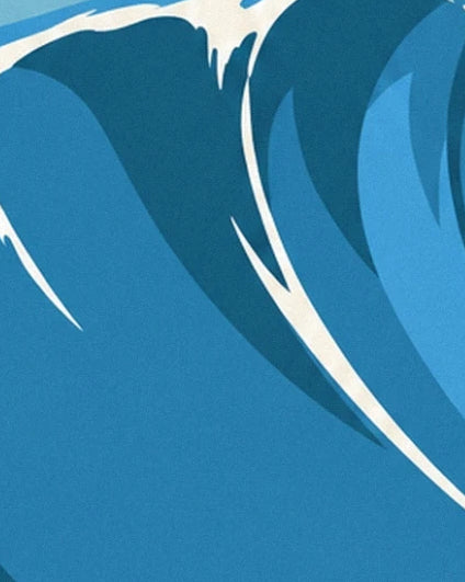 La curva imponente dell'onda blu e le sue lunghe scie di schiuma bianca