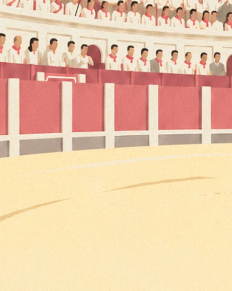 Spectators in white with red scarves behind the arena's red barrier and golden sand