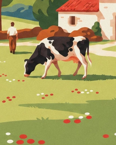 Une vache noire et blanche dans l’herbe fleurie, devant une maison au toit rouge