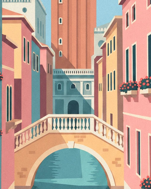 Un piccolo ponte di pietra bianca sul canale, tra facciate rosa e ocra