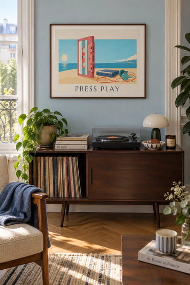 Poster of an audio cassette, a portable player and headphones on a desk: framed on the wall
