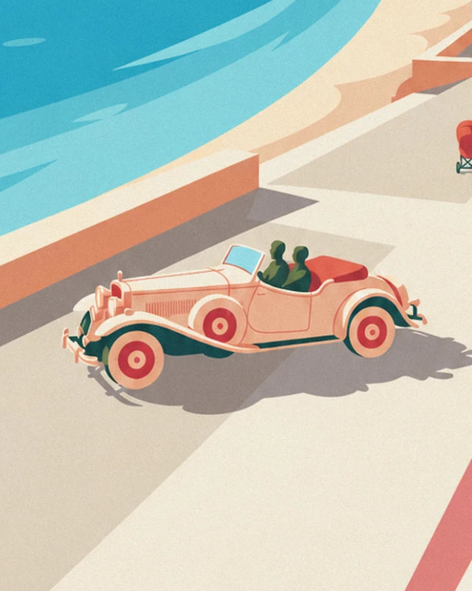The cream convertible with red wheels and its 2 passengers, on the seafront promenade