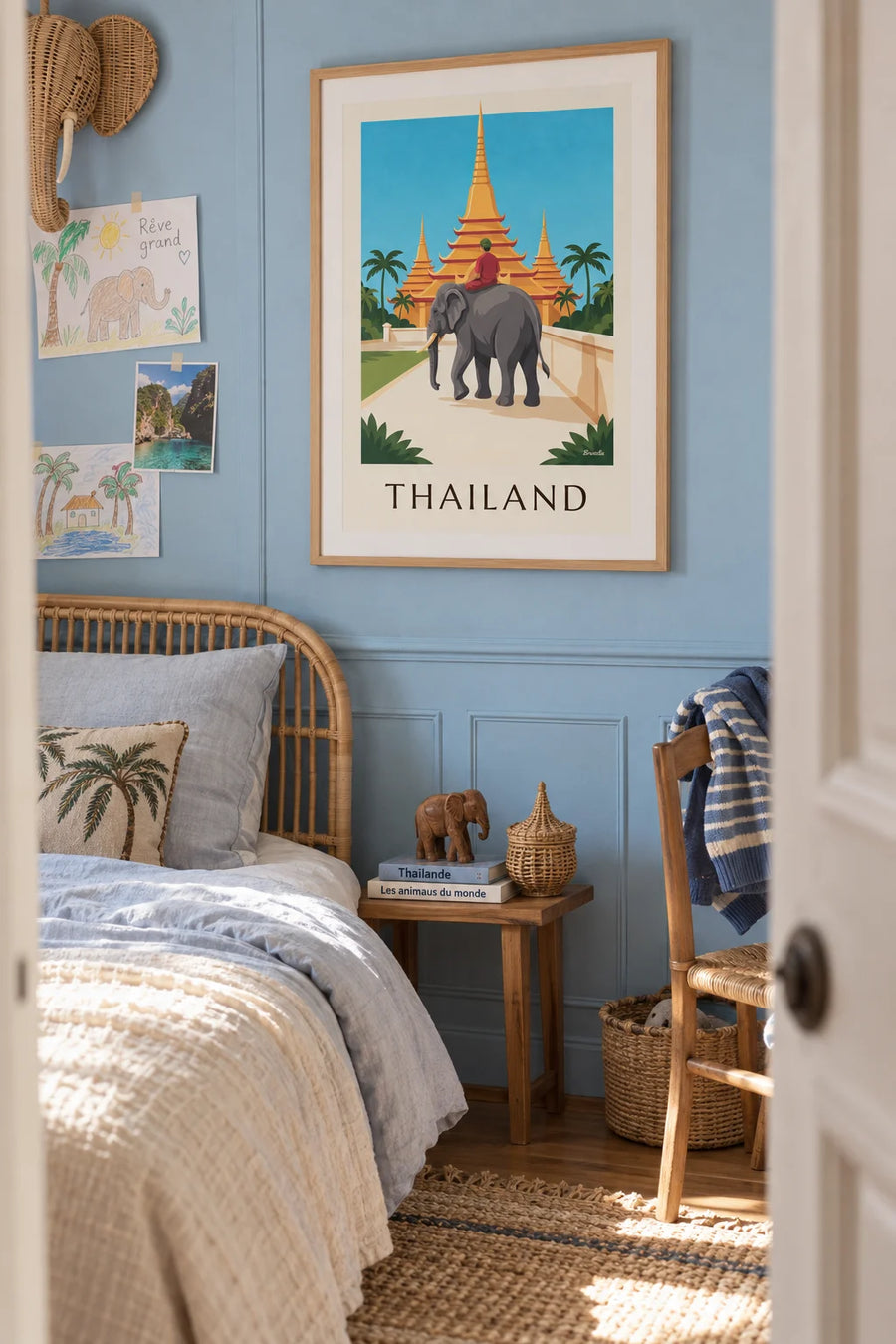 Poster of an elephant and golden pagodas in Thailand: framed on the wall