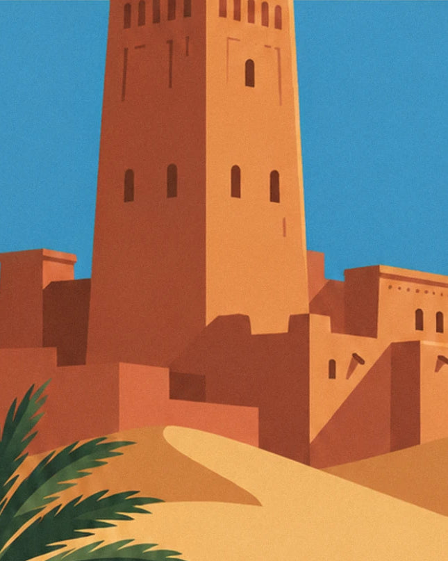 The tall ochre earth tower of the casbah, its small windows and a green palm frond, beneath a blue sky