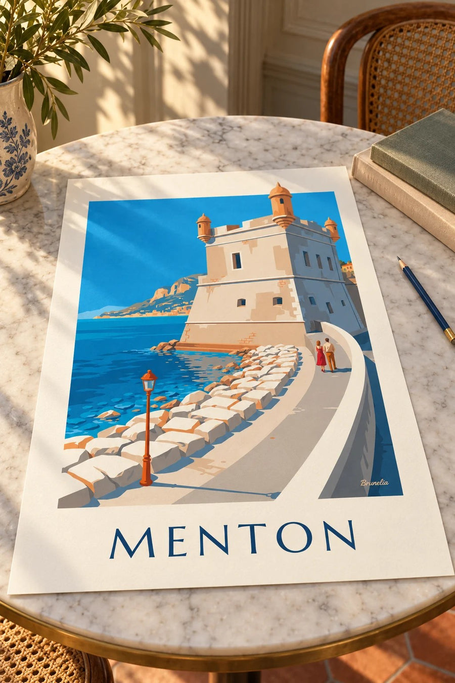 Affiche del Bastione del vecchio porto di Mentone sul mare : appoggiato su un tavolo