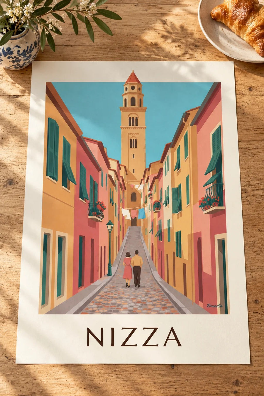 Poster vicolo colorato della Vecchia Nizza e campanile di Santa Reparata: appoggiato su un tavolo