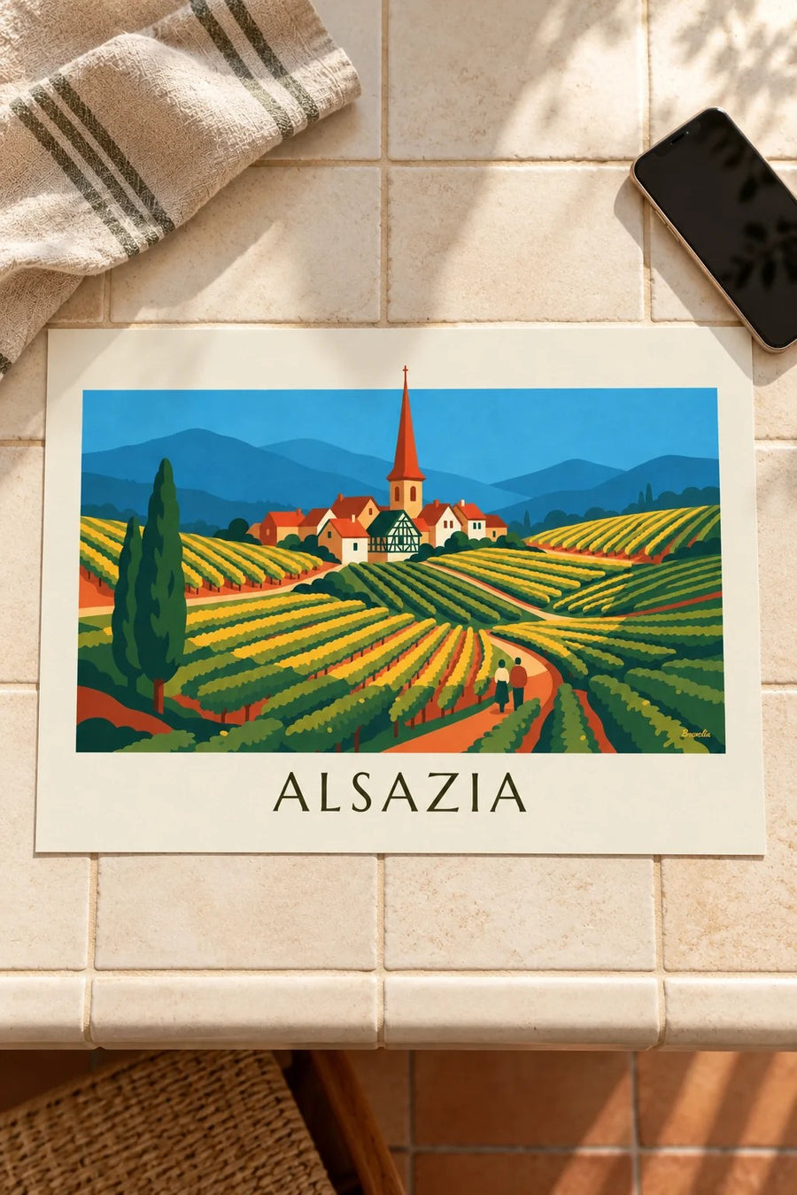 Poster strada del vino e vigneti a terrazze dell'Alsazia: appoggiato su un tavolo