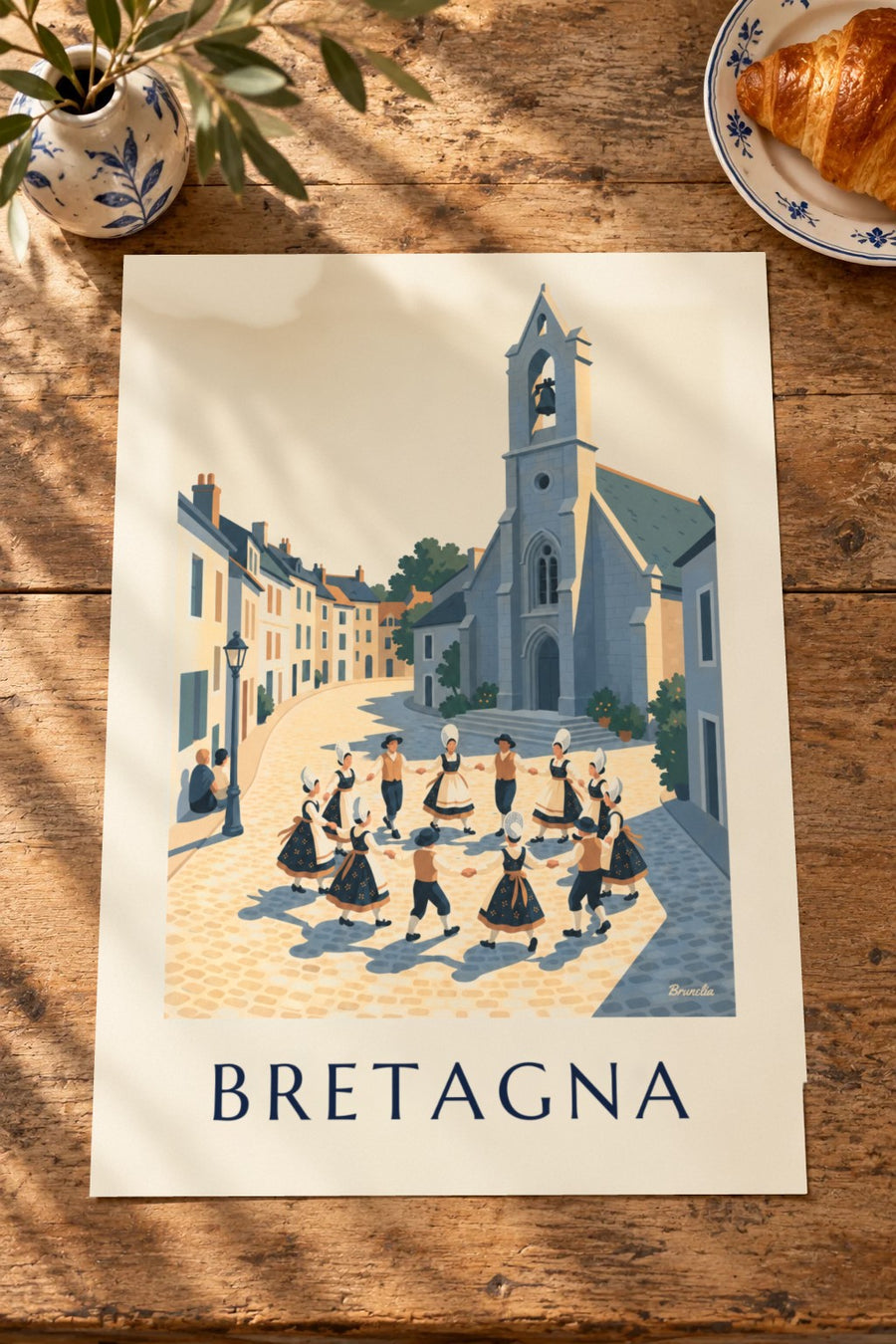 Poster danza bretone in costumi tradizionali sulla piazza: appoggiato su un tavolo