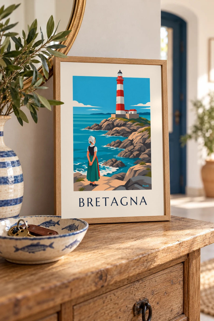 Poster donna con cuffia bretone davanti a un faro rosso e bianco: piccolo formato A4 incorniciato