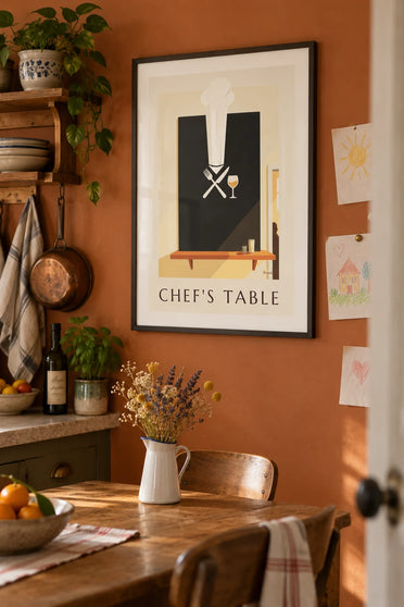 Poster of a chef’s hat, cutlery and a glass of wine on slate: framed on the wall