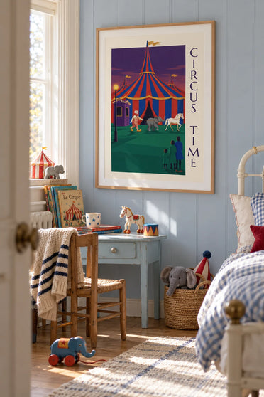 Poster of a clown, a baby elephant and a white horse in front of the big top: framed on the wall