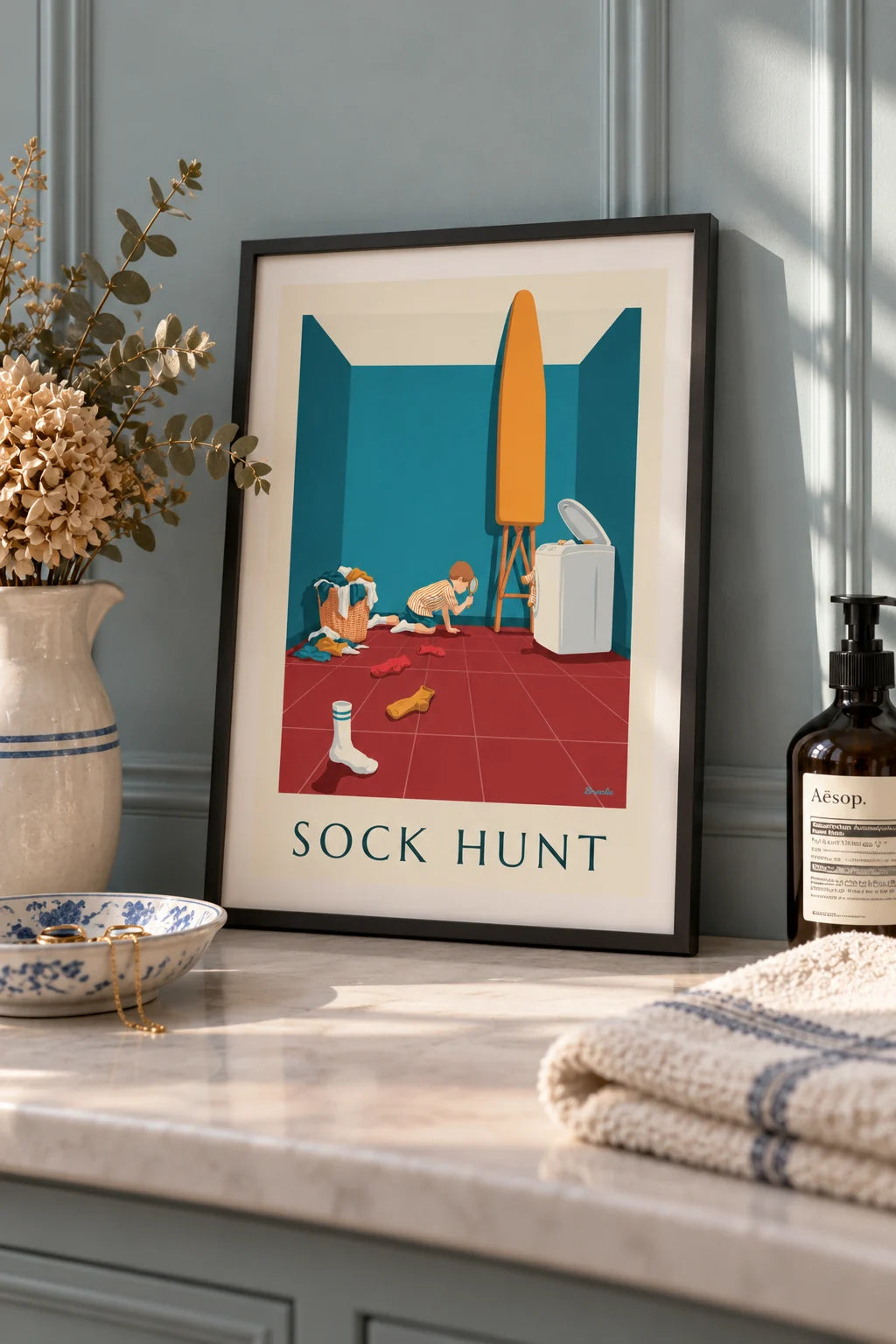 Laundry room: Boy with magnifying glass on the sock trail poster on the wall