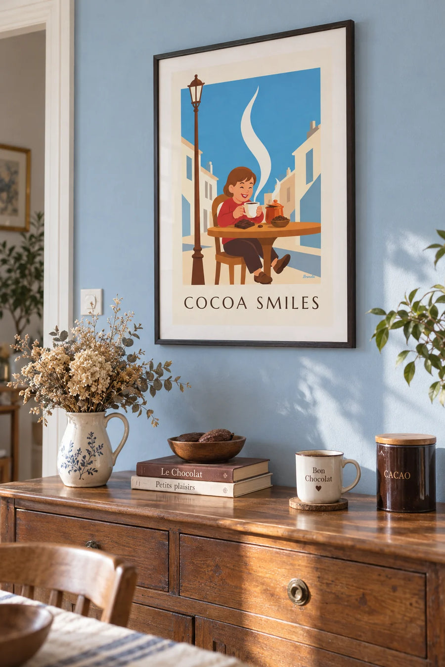 Poster of a smiling child with a big cup of hot chocolate: framed on the wall