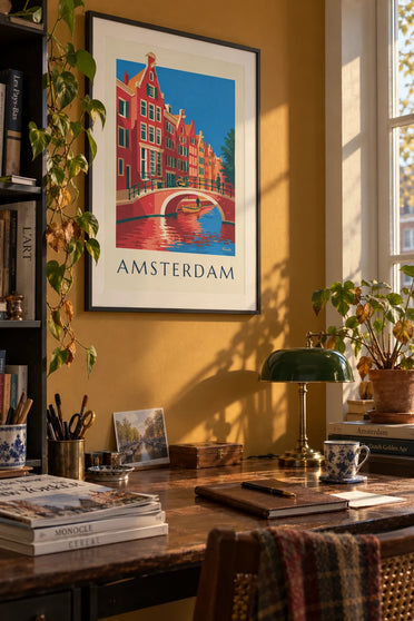 Poster of gabled houses and a bicycle on an Amsterdam bridge: framed on the wall