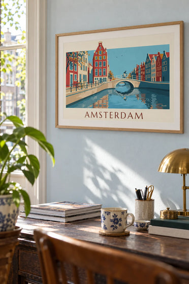Poster of a bridge over an Amsterdam canal and colorful gabled houses: framed on the wall