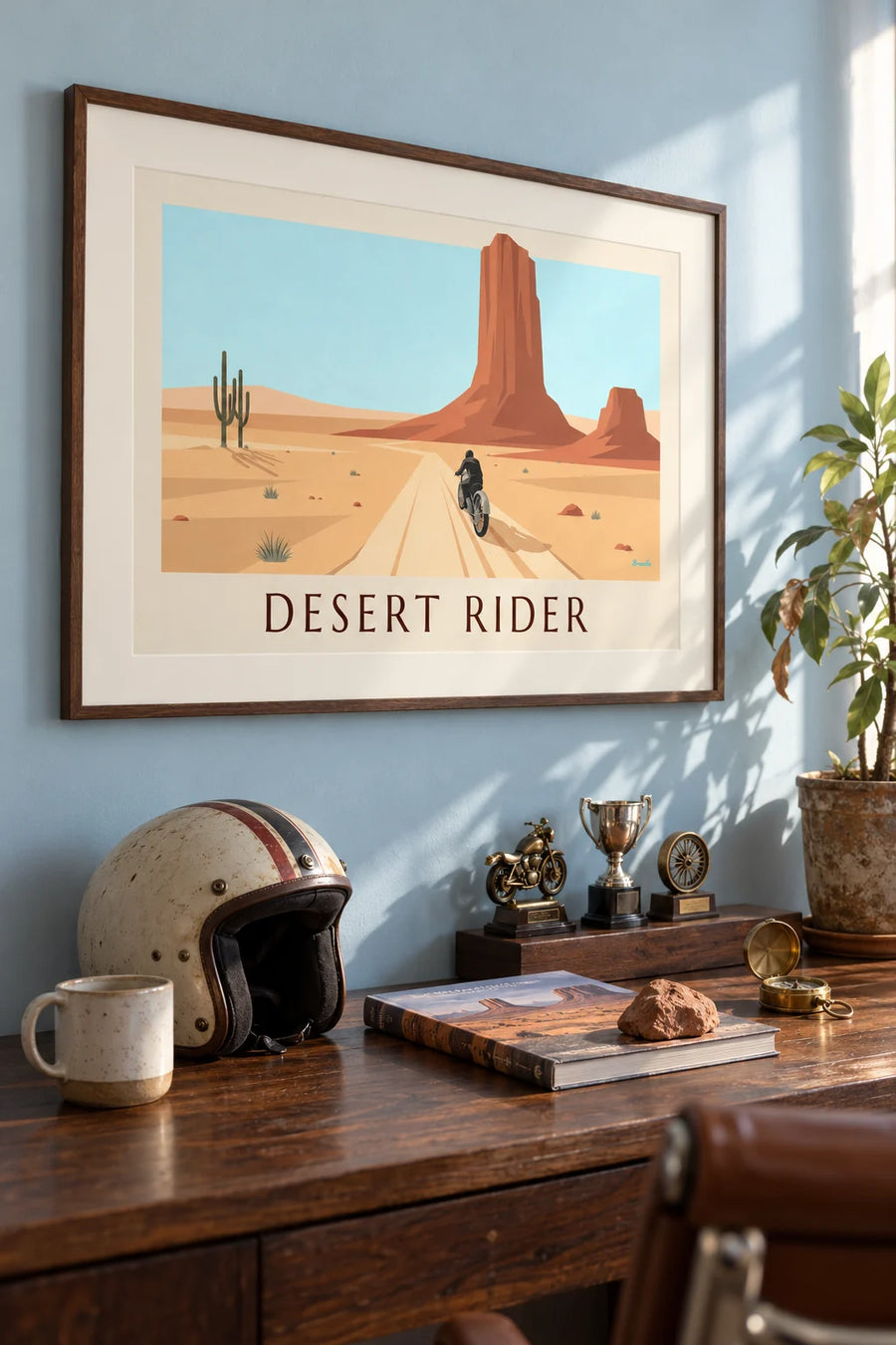 Poster of a motorcyclist on a sand track in the desert: framed on the wall